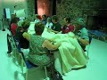 angus mcleod, a teacher at the gaelic college, leads a group of clan ross members as we sing in a 