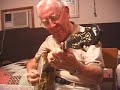 jim robinson, 88 years old, practices on his 1931 gibson mastertone tb5, at a guest cottage in joplin, mo, in 2001