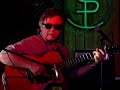 tim sparks at the 10,000 lakes festival in minnesota. awesome acoustic fingerstyle guitar picking.
http://www.timsparks.com/