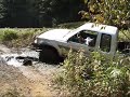 Toyota 4x4 Pickup Truck in a Leatherwood Mud Hole Toyota 4x4 Pickup Truck in a Leatherwood Mud Hole