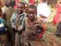 Arik dances with the Gechi children in Ethiopia