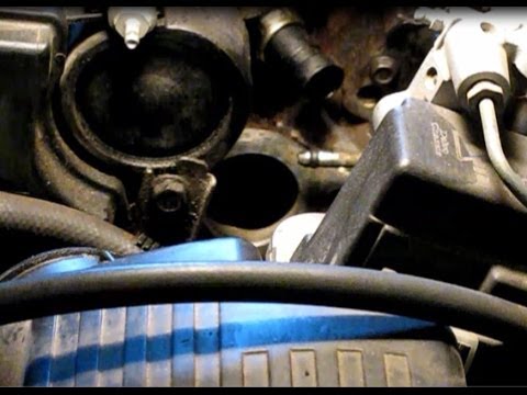 Repairing a coolant leak on a 2.4L GM Grand Am Part 2: Installing water outlet