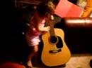 Lily playing Guitar