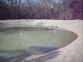 Final stages of new pond construction in Magnolia Texas Final stages of new pond construction in Magnolia Texas