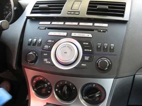 How to Remove Radio / CD Changer / Display from Mazda 3 2010 for Repair.