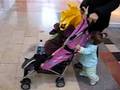 Sofia pushing stroller