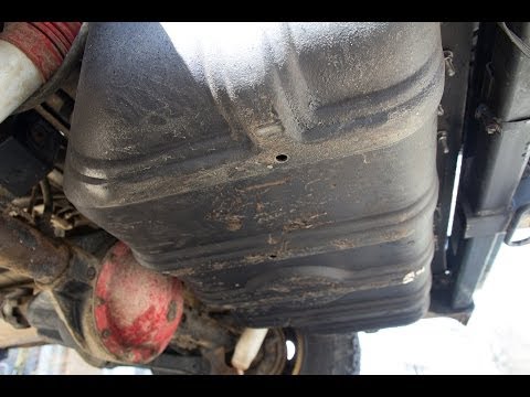 Removing Rusted Gas Tank Skid Jeep Wrangler TJ
