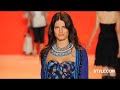 Runway, backstage, and front-row footage from the show.