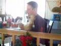 Chinese Crested Powder Puff puppy plays air drums guitar