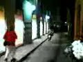 BORO fans drinking after the UEFA match against GRAZ are approached by a flower seller on a bike-