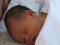 3-day-old baby listens to Mozart and ponders 3-day-old baby listens to Mozart and ponders