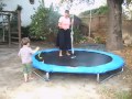 Liam & his grandmother try out the new trampoline on his third birthday.