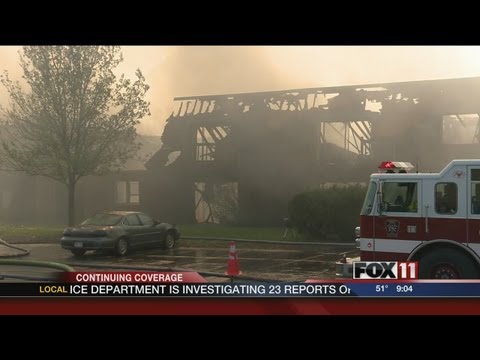 wluk - Fire crews remain on scene tonight, fighting a fire that started late this morning at a 74-unit apartment building.