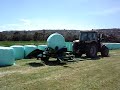 Silage wrapper and cat tractor Silage wrapper and cat tractor