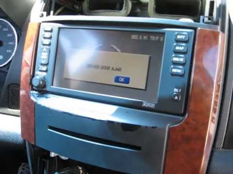 How to Remove Radio / Navigation / CD Changer from Cadillac SRX  2005 for Repair.