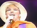 debbie gibson performs a pop single in possibilities tour.