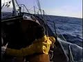 classic wooden boat sailing