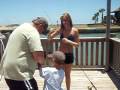 Young Lady catches fish.