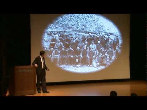 physics - Five physicists duke it out with 12 minutes each to explain a complex particle physics concept in front of a large audience of the general public. Then an ap...