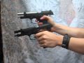 (Airsoft) Akimbo Beretta reloads.