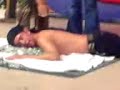 Man lays on glass - holiday show Man lays on glass - holiday show