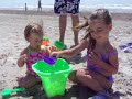 Skyla and Sydney playing on the beach