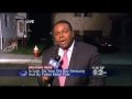 News Blooper: Man falls out of window behind oblivious reporter