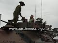 ARMY AUSTRALIA tank the lads the babe are on a serious mission stay tuned watch youTUBE for the sequelwww.aussiemuscle.go.tothe DEFENCE FORCE needs ????? dtm2004 (2 days ago)   FALSE DATA - this entry should be heavily edited or deleted as you should have had enough time to correct the title and details. Previous comments on this video have been ignored............. maw888 (1 week ago) R Hay numnut no its not an M1 its an ASLAV I should know I was one of the test drivers for the Canadian LAV25. We got to trial for the corp when the Australine Army did the trials back in the 90s. I also was one of the people to put forward some of the changes to the ASLAVS that you see todayAnd when the ASLAVs where finished of at Albury Wodonga I drove them to the SCHOOL OF ARMOR at Puckapunyal and put them through there paces out bush.So no it is not an M1 but an AUSSIE ASLAV muddydigger (1 month ago) Show  yep itsan ASLAv not an abrams tank GT71XY (1 month ago) Show Hide +1   That's not a Abrams tank it's a ASLAV. falconGTHOPHASE4 (1 month ago) are you sure? GT71XY (1 month ago)  For starters I'm pretty sure that the ABRAMS tank has tracks and not tires, and the main gun's a bit bigger then the one pictured.