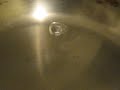 Water drops scrambling on a hot pan