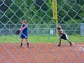 Jenna playing softball