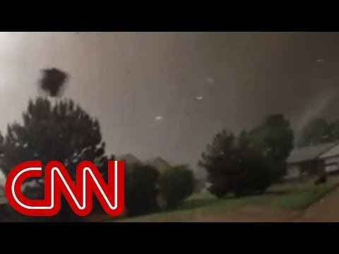 hits - iReporter Jeff Lechus talks about driving to pick up his son from school as a tornado hit the area.