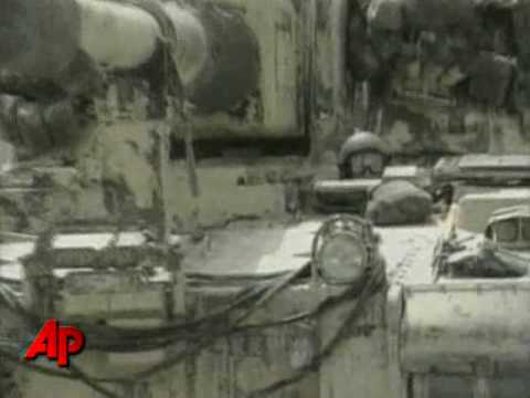12000 US Troops Withdrawn from Iraq; 32 Killed in Police Academy Bombing