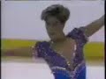 After winning the short, Jill Trenary flubs a few landings and omits a key jump combination in the long, finishing second there and second overall to Kristi Yamaguchi at the 1990 Goodwill Games.  This would be Trenary's final amateur-level competition before retiring, and the only one in which she would skate without the benefit of school figures. Commentary by Jim Kelly and Debi Thomas.