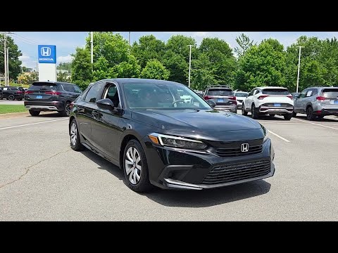 Used 2023 Crystal Black Pearl Honda LX image 1