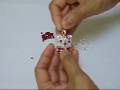 videos de Hello Kitty Swarovski crystal bead waeving by All-Cool-Crafts