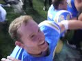 UCLA players high five students after beating U$C UCLA players high five students after beating U$C