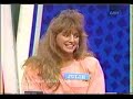 Bob Eubanks arm wrestles Raye Hollitt