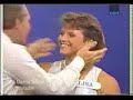 Bob Eubanks arm wrestles Raye Hollitt