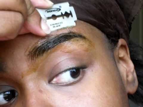 how to trim eyebrows using blade