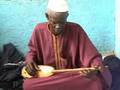 Xhalam playing by Abdulai Saine,Gambia 2002