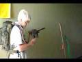 Backpack fed paintball marker