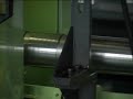 Line of two centerless grinders for grinding tubes