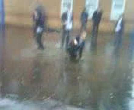 Kirstie sitting in a puddle!!