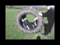 Man in Tyre down hill