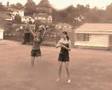 Girls running through sprinklers!