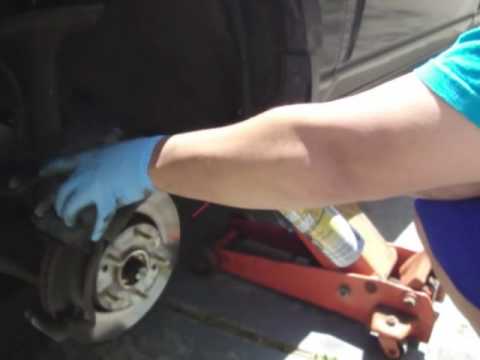 change brakes - An exclusive educational video on how to change brake pads all by yourself on a 2006 Kia Sportage.
