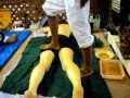 Thai hot oil massage with burning coals