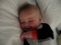 Smiles even when he is asleep