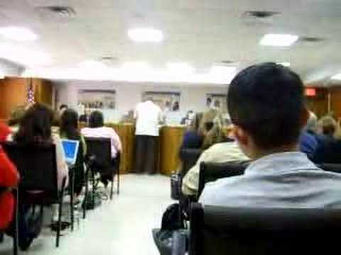 Gene Garcias addresses board on 3/24