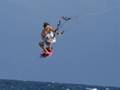 Kiteboarding saut énorme Hurdman Andy, cow-boy en eau de mer